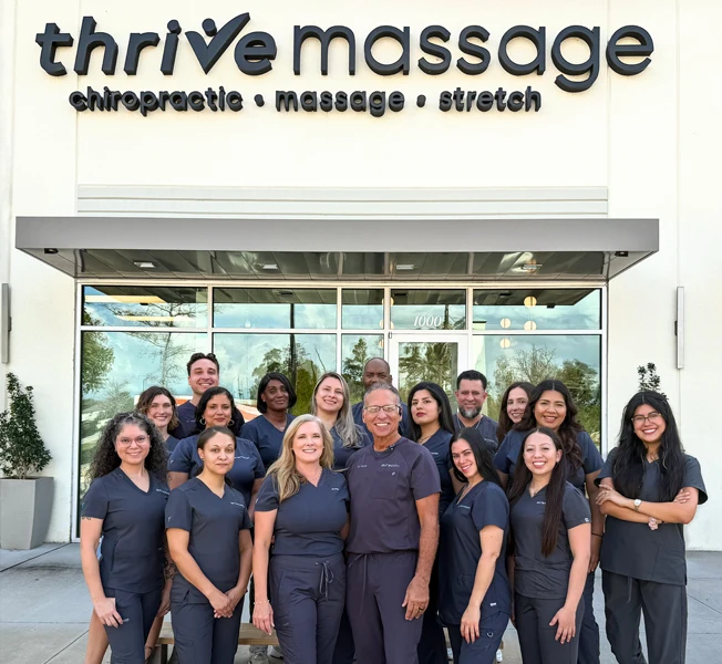 Paul Vozza And Team Posing Outside The Clinic for a Group Photo