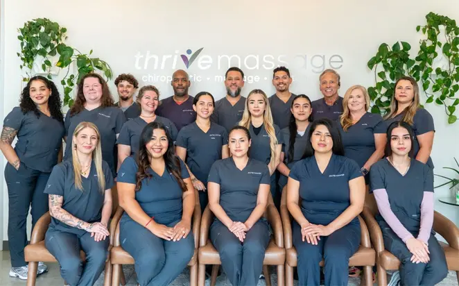 Paul Vozza And Team Posing Outside The Clinic for a Group Photo