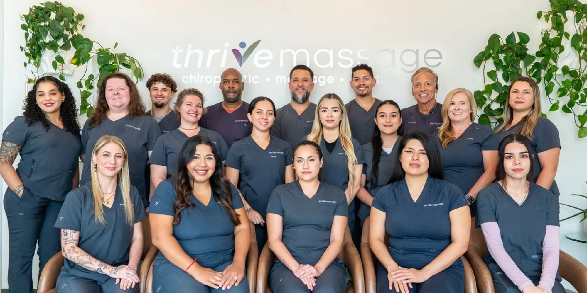 Paul Vozza And Team Posing in Clinic for a Group Photo